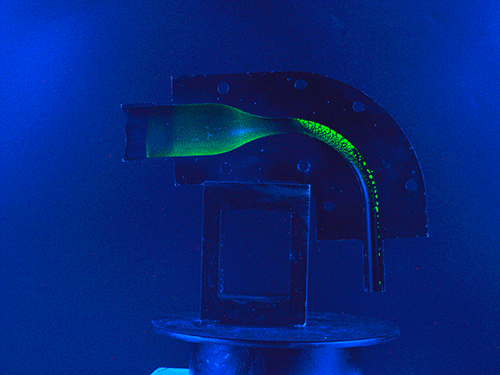 The Deposition Pattern of Nebulized Fluorescent Droplets in an Idealized Mouth throat Airway